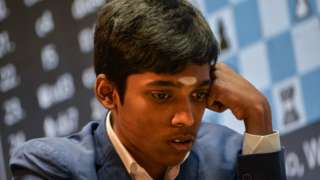 Rameshbabu Praggnanandhaa of India ponders his next move against Wesley So of USA during their blitz chess match (open blitz tournament) on the last day of Tata Steel Chess India 2022 tournament, in Kolkata, on December 04, 2022.